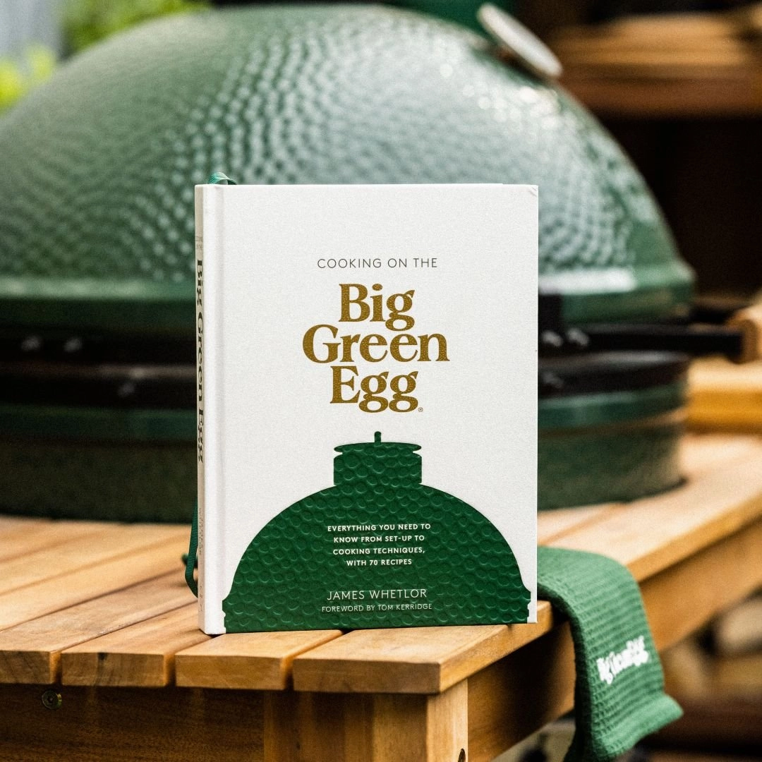 Cooking on the Big Green Egg outdoor kitchen cooking station with sink
