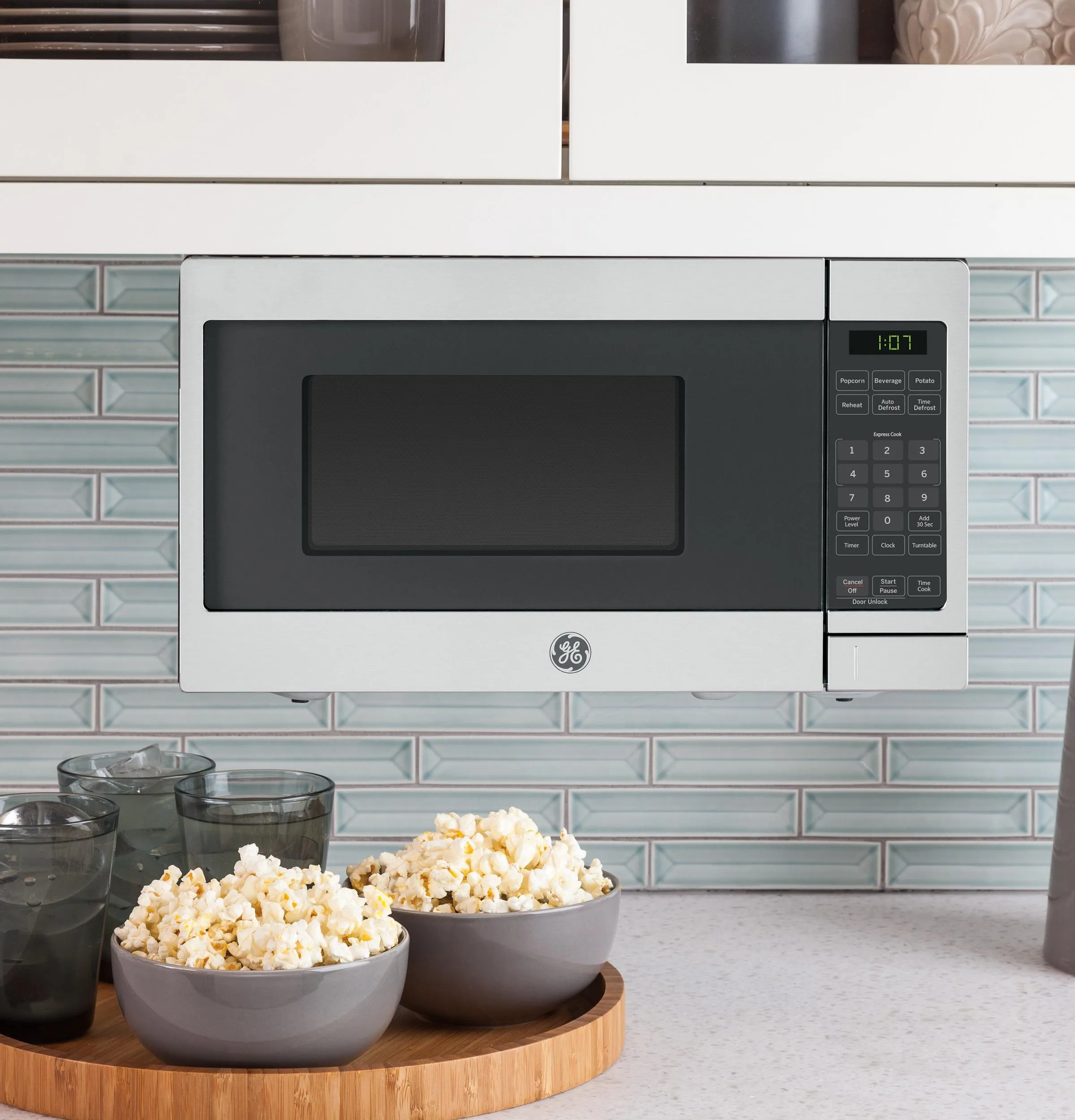 Ge Appliances GCHK07N1WSS Ge? 0.7 Cu. Ft. Spacemaker? Countertop Microwave Oven