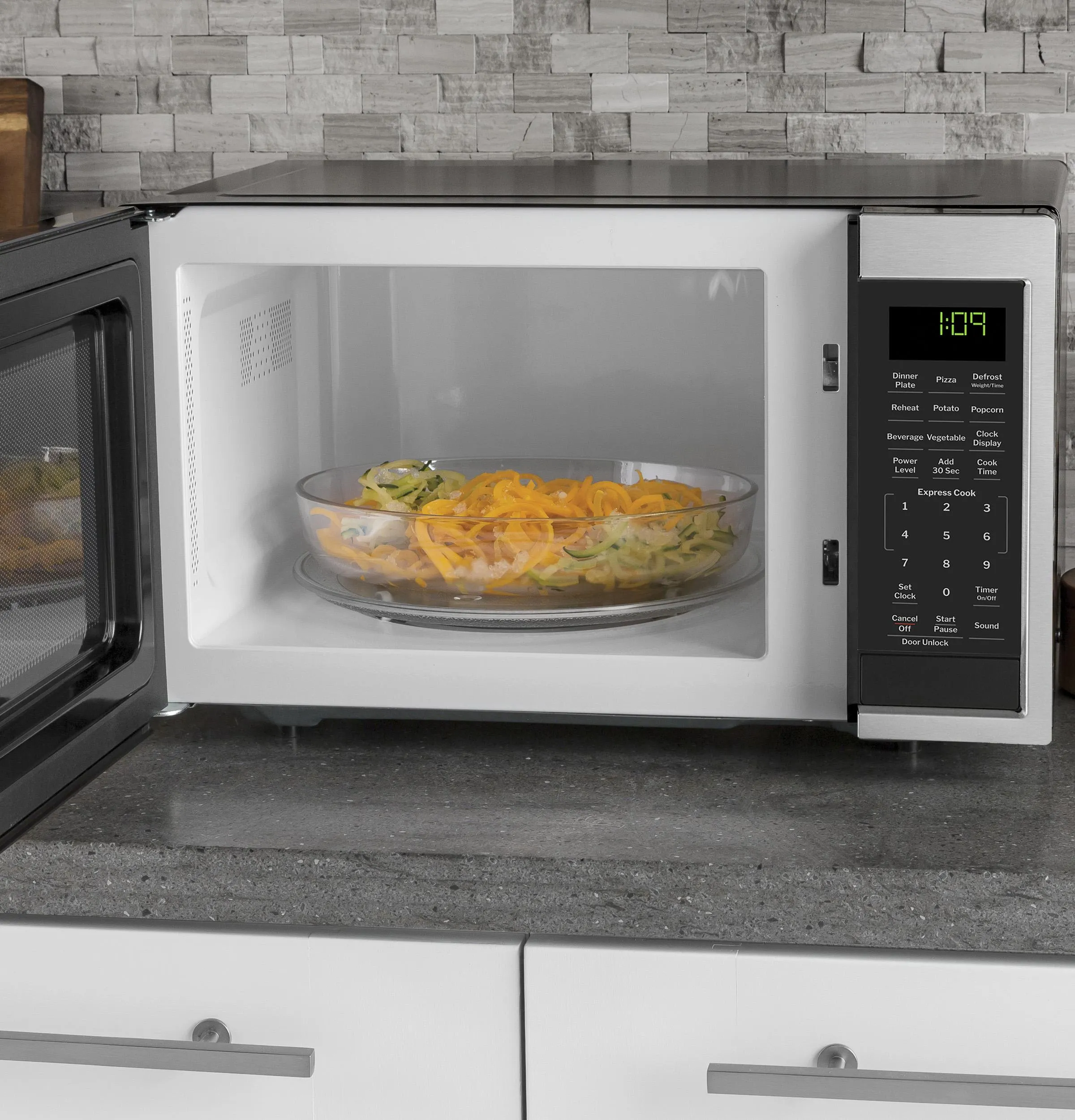 Ge Appliances GCST09N1WSS Ge? 0.9 Cu. Ft. Capacity Countertop Microwave Oven