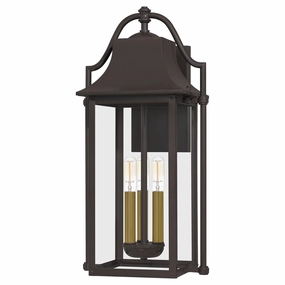 Manning Three Light Outdoor Wall Mount Western BronzeOutdoor wall sconces with motion sensor